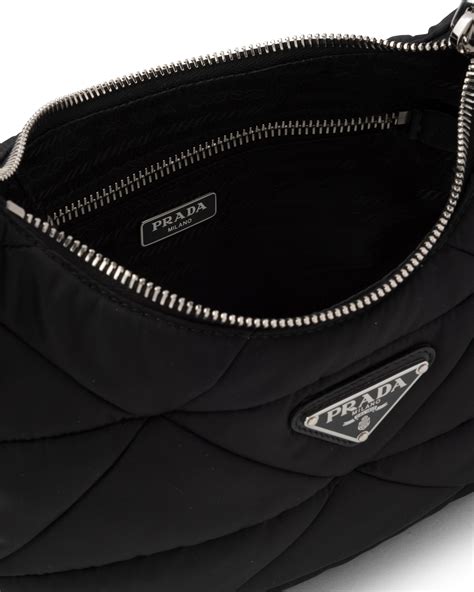 prada canvas leather handbag|Prada padded nylon shoulder bag.